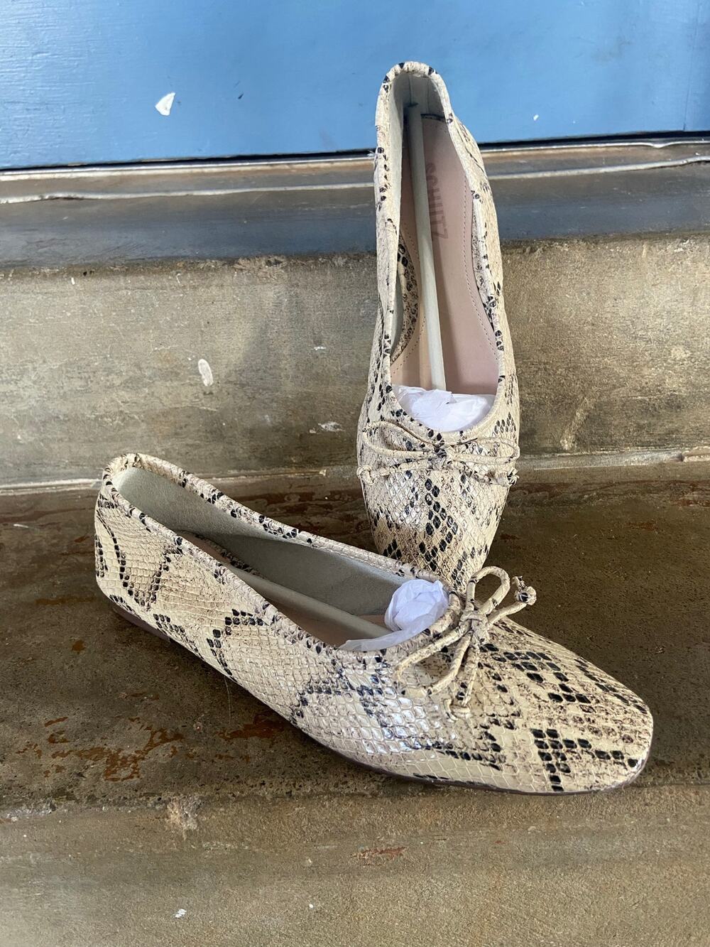 Schutz cream snake embossed ballet style flats with bow detail